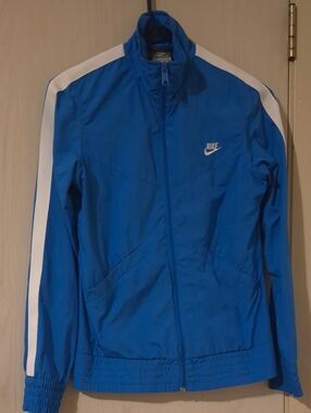 Nike Women's Blue Track Jacket with White Sleeve Stripes